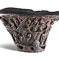 A rhinoceros horn ‘figure’ libation cup, 17th century