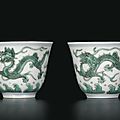 A pair of fine green enamelled 'dragon' wine cups, seal marks and period of daoguang (1821-1850)