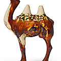 A sancai-glazed pottery figure of a bactrian camel, Tang dynasty (AD 618-907)
