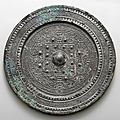 A silvery bronze 'TLV' circular mirror, Han Dynasty (206 BC-AD 220)