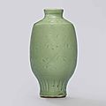 A carved Longquan celadon vase, Ming Dynasty (1368-1644)