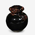 A Chinese 'Henan' black glazed 'five turtles' vase, Song dynasty (960-1127)