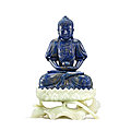 A finely carved and rare lapis lazuli figure of amitabha buddha on a white jade lotus stand, qing dynasty, qianlong period