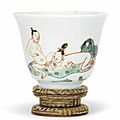 A small famille verte erotic subject cup, Kangxi period (1662-1722)