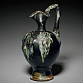 A rare splash-glazed applique-decorated ewer, Tang dynasty, 7th-8th century