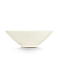 A white-glazed conical tea bowl, Tang dynasty (618-907)