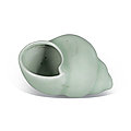 A celadon-glazed conch shell-form waterpot, qing dynasty, 18th century