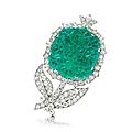 An art deco carved emerald, pearl and diamond flower brooch, by cartier, circa 1935