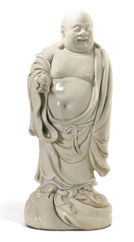 A Dehua figure of Budai, Qing dynasty, 18th century