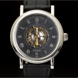 Bonhams : PATEK PHILIPPE A RARE BROWN LEATHER AND CANVAS TRAVEL