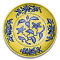 A yellow-ground and underglaze-blue 'Gardenia' dish, Zhengde mark and period (1506-1521)