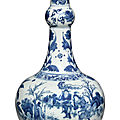 A blue and white 'figural' garlic-neck bottle vase, ming dynasty, chongzhen period (1628-1644)