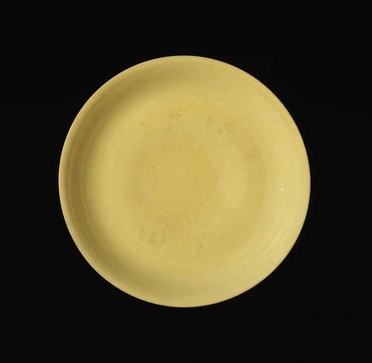 Porcelain dish with monochrome yellow glaze