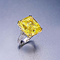 An impressive 39.01 carat fancy vivid yellow diamond ring