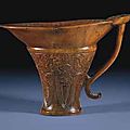 A rhinoceros horn archaistic libation cup, 17th centurya rhinoceros horn archaistic libation cup, 17th century