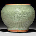 A Longquan celadon carved baluster jar, guan, early Ming dynasty, 15th century