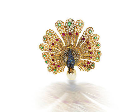 A_rare_gem_set_and_diamond_peacock_brooch__by_Gustave_Baugrand__circa_1867