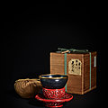 An exceptional heirloom jian 'nogime tenmoku' tea bowl, southern song dynasty and a cinnabar lacquer 'guri' bowl stand, yuan dyn