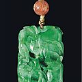 A carved jadeite 'bat and peach' pendant, 18th-19th century