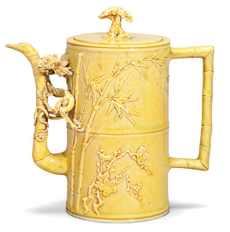 A yellow glazed carved ewer, late 19th century