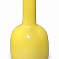An opaque yellow glass 'horse hoof'-shaped vase, Qianlong four-character wheel-cut mark within a square and of the period (1736-1795)