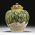 A sancai-glazed pottery jar and cover, tang dynasty (618-907)