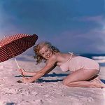 1949_tobey_beach_by_dedienes_umbrella_red_072_1