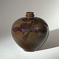 A 'Tea-Dust' Glazed Bottle Vase With Birds in Flight