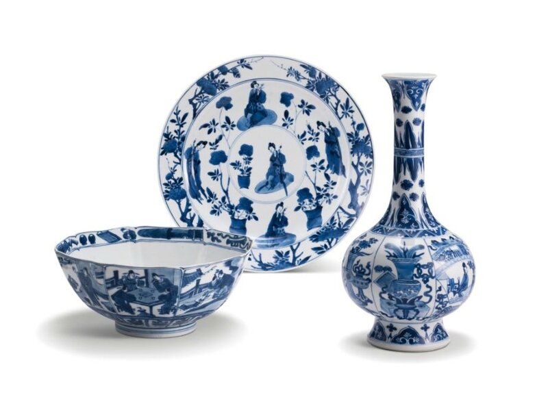 A blue and white bottle vase, a bowl and two dishes, Transitional ...