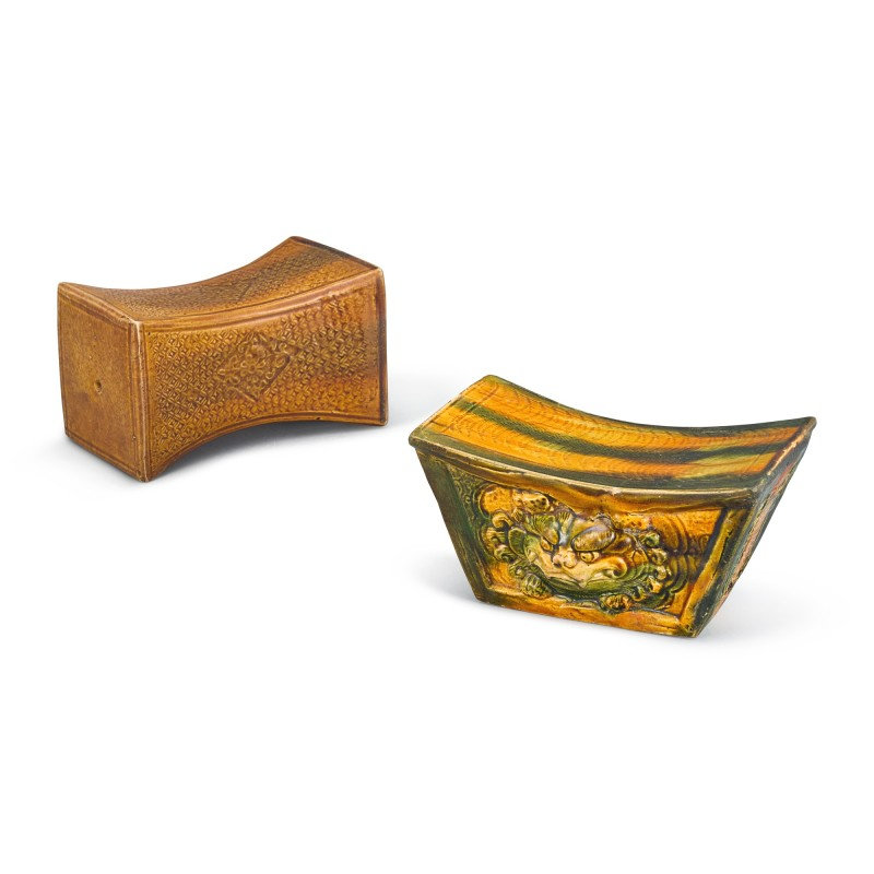 A sancai 'mythical beast' pillow and an amber-glazed 'diaper' rectangular pillow, Northern Song dynasty (960-1126)