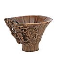 An archaistic rhinoceros horn libation cup, 18th century