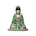 A famille-verte glazed biscuit figure of guanyin, qing dynasty, kangxi period (1662-1722)