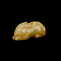 A small yellow jade figure of a rabbit, song dynasty or earlier