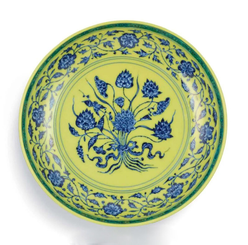 A rare underglaze-blue and yellow-enamelled 'Lotus bouquet' dish, mark and period of Yongzheng (1723-1735)