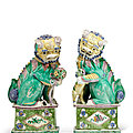A pair of chinese porcelain famille verte large buddhist lions, kangxi period (1662-1722)