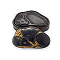 A rare lacquer 'water buffalo' ink stone with original box and cover, qing dynasty, 18th century