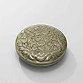 A Yue celadon carved and moulded ‘peony’ circular box and cover, Northern Song dynasty (960-1127)