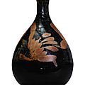 A slip-decorated brown-glazed Henan pear-shaped vase, Jin dynasty