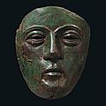 A roman bronze and iron cavalry parade mask, circa 1st century a.d.