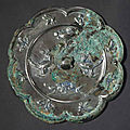 A silvery-grey bronze eight-lobed mirror, Tang dynasty (618-907)