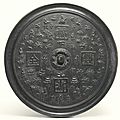 A large Chinese bronze mirror, 17th-18th century