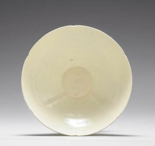 A large plain white-glazed foliate bowl, Song dynasty (960-1279)