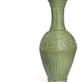 A large carved Longquan celadon trumpet-necked vase, Yuan dynasty (1279-1368)