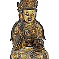 A gilt-bronze seated figure of guanyin, late ming dynasty (1368-1644)