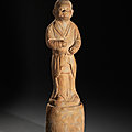 A rare documentary pottery figure of a groom, Late Tang Dynasty, dated by inscription to 868 AD and of the period
