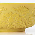 A rare large carved opaque imperial yellow glass bowl, Qianlong engraved four-character mark within a square and of the period (1736-1795)