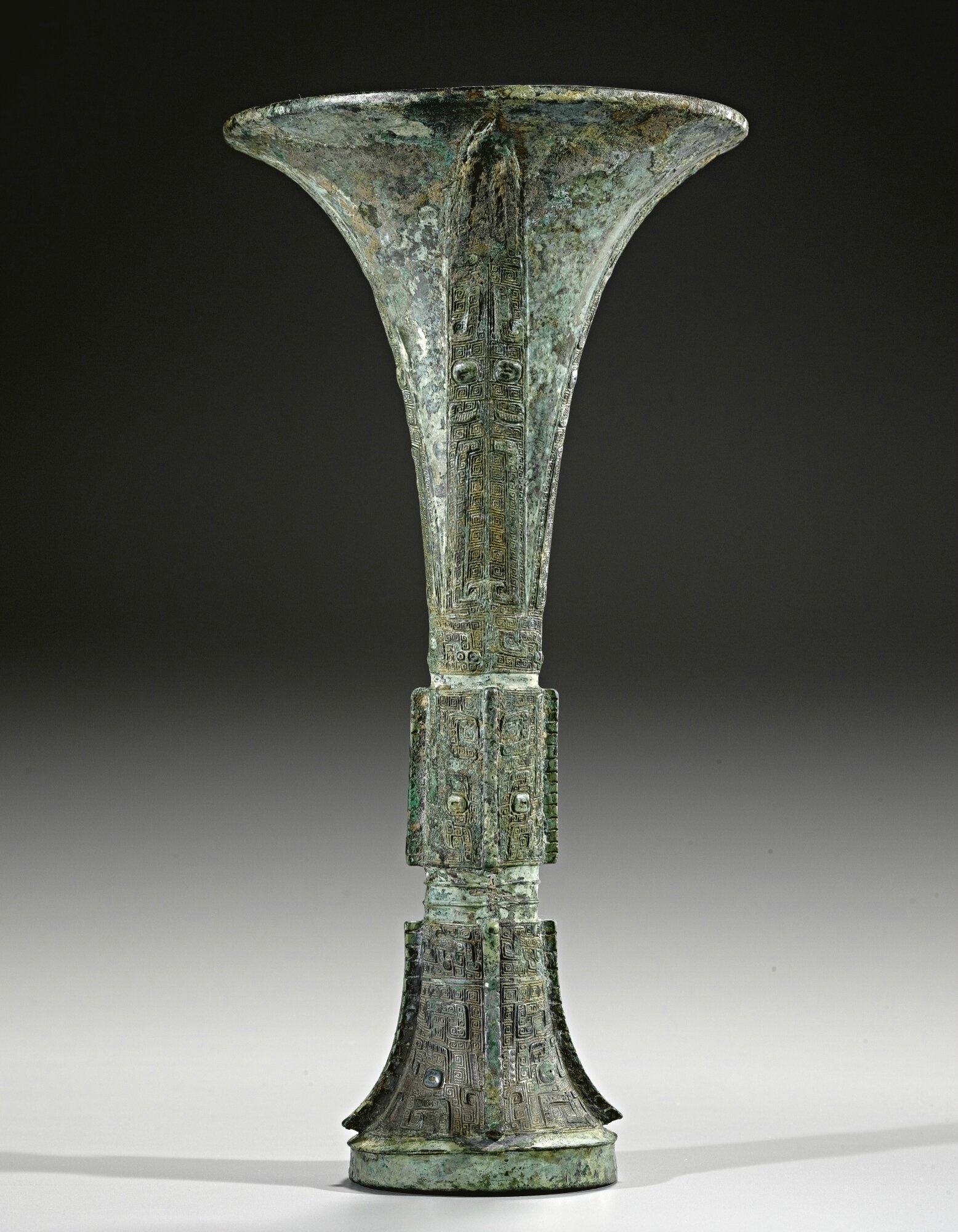 An archaic bronze ritual food vessel, gu, Shang dynasty, 12th century BC