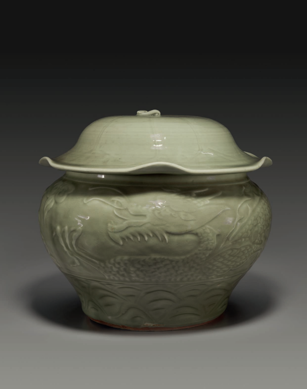 A rare Longquan celadon carved jar and cover, Yuan dynasty, 14th century